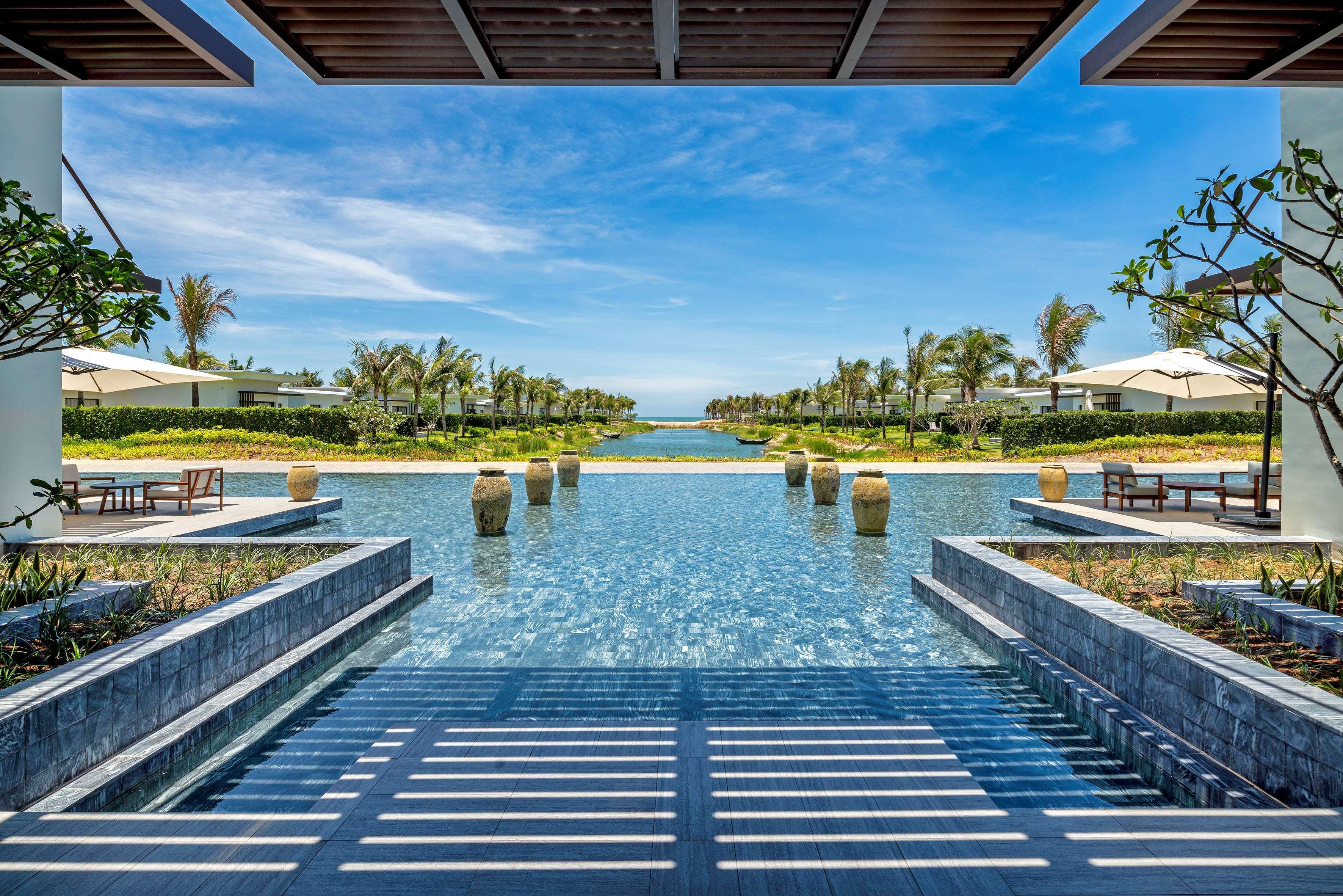 Melia Ho Tram Beach Resort Exterior photo The pool at the Sheraton Nha Trang Hotel & Spa Resort