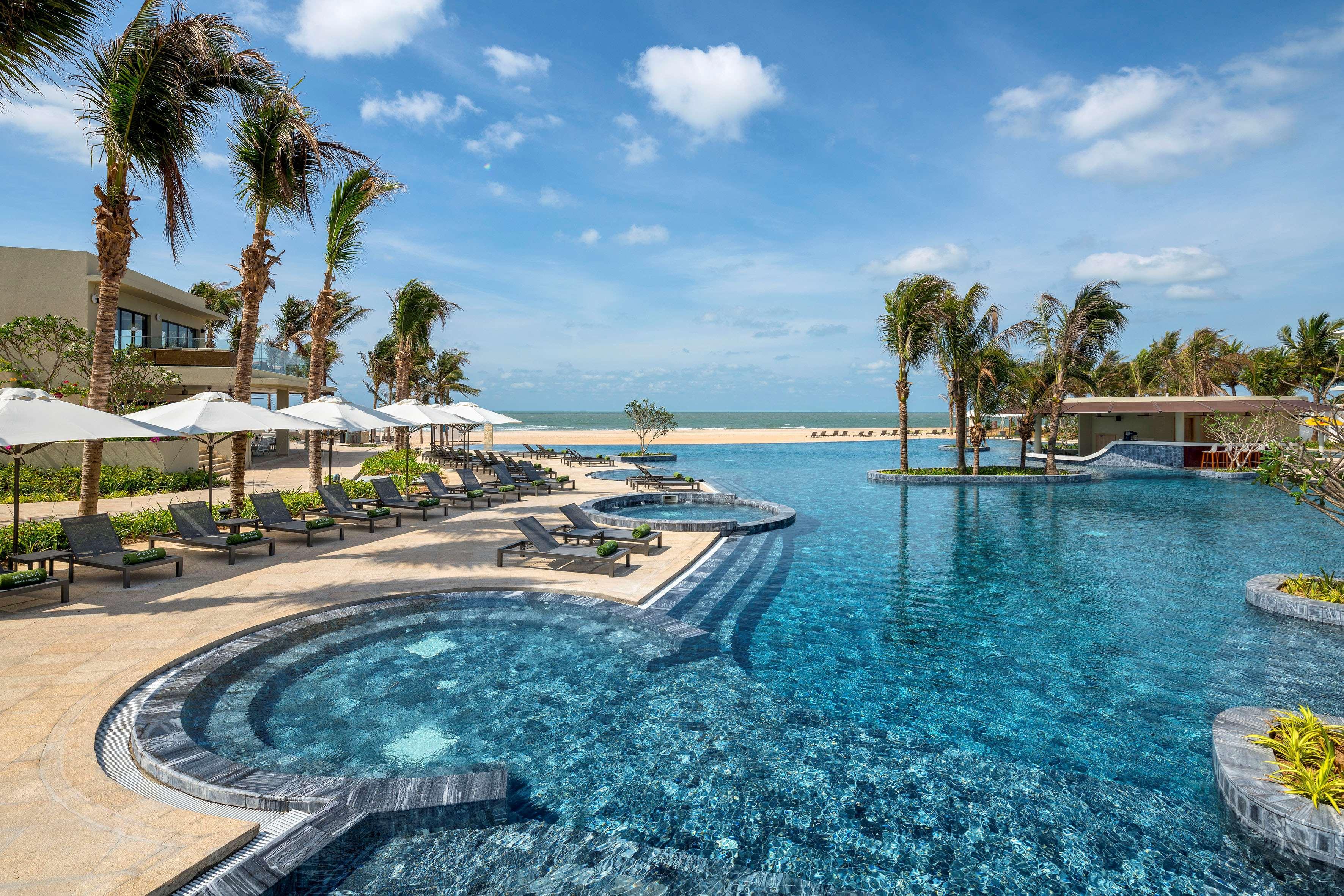 Melia Ho Tram Beach Resort Exterior photo The pool at the Sheraton Nha Trang Hotel & Spa Resort